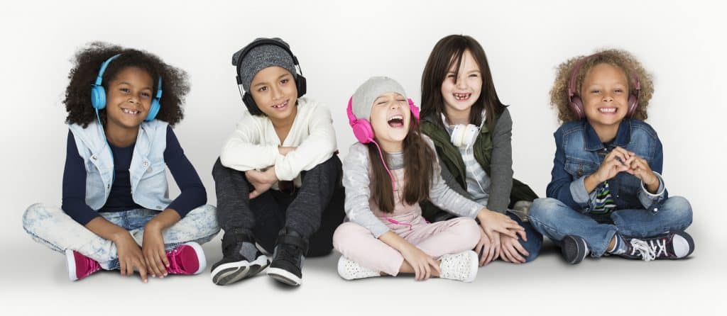 Group of Children Studio Smiling Wearing Headphones
